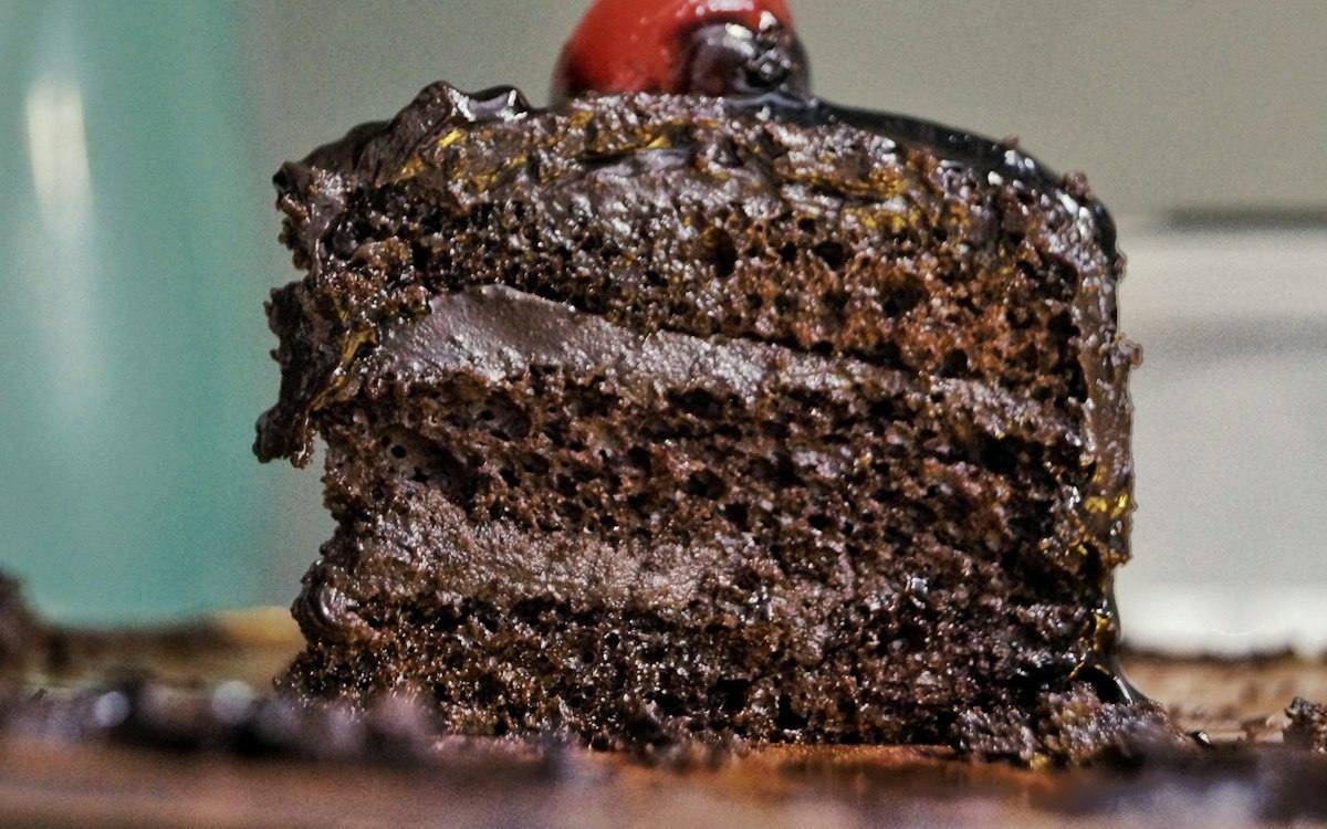 Chocolate cake with glossy chocolate sauce, made with food emulsifiers and stabilisers